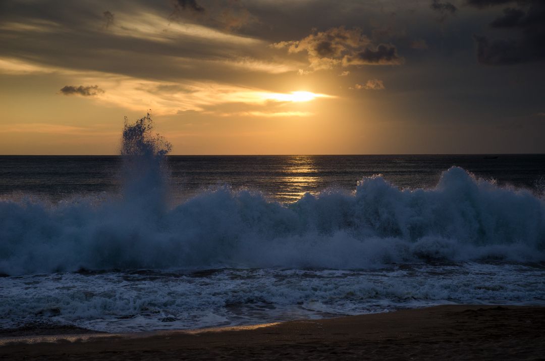 Powerful Ocean Waves Crashing at Sunset - Free Images, Stock Photos and Pictures on Pikwizard.com