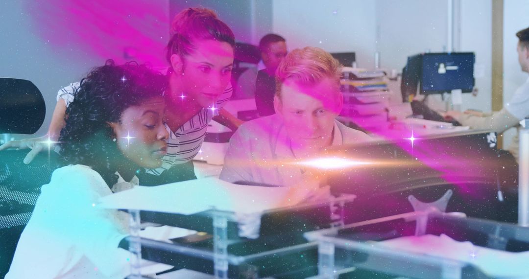 Coworkers Collaborating on Project with Modern Dual Monitors