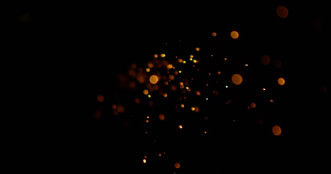 Abstract Golden Bokeh Light Sparkles on Black Background - Free Images, Stock Photos and Pictures on Pikwizard.com