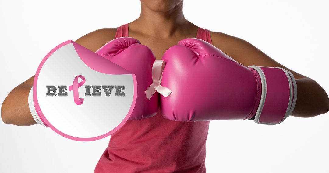 Woman Wearing Pink Boxing Gloves Showing Breast Cancer Awareness Message - Free Images, Stock Photos and Pictures on Pikwizard.com