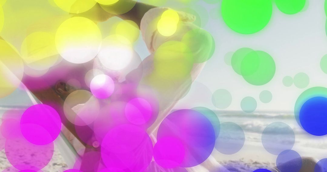 Relaxing on Beach: Mature Man Enjoying Sunny Atmosphere with Bokeh Effect