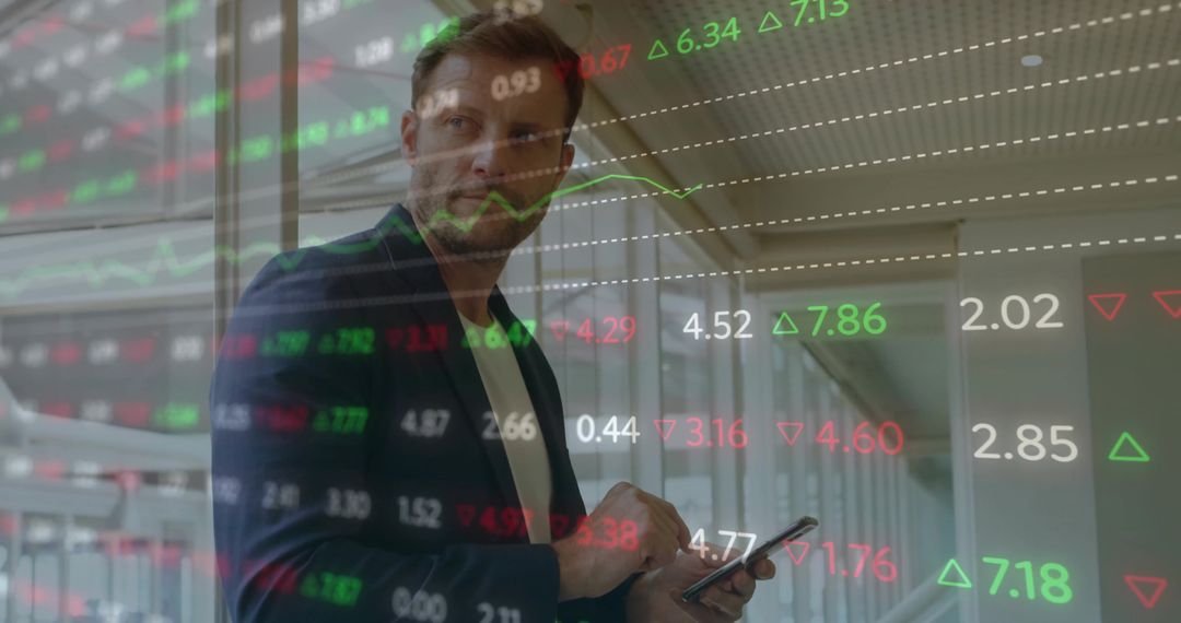 Businessman Analyzing Stock Data with Graphs Overlaid