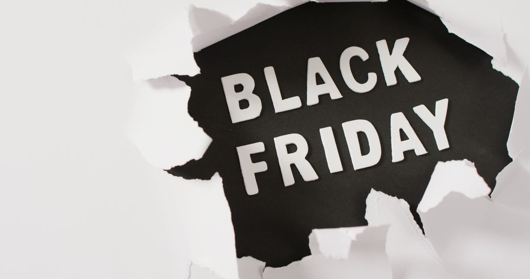 Black Friday Text Within Torn Paper Background - Free Images, Stock Photos and Pictures on Pikwizard.com