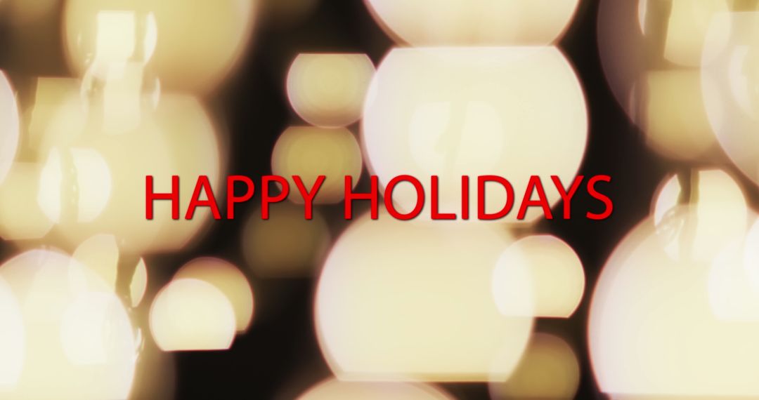Happy Holidays Text with Festive Warm Light Bokeh