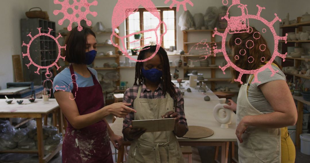 Women Discussing Pottery Techniques Amid Safety Precautions