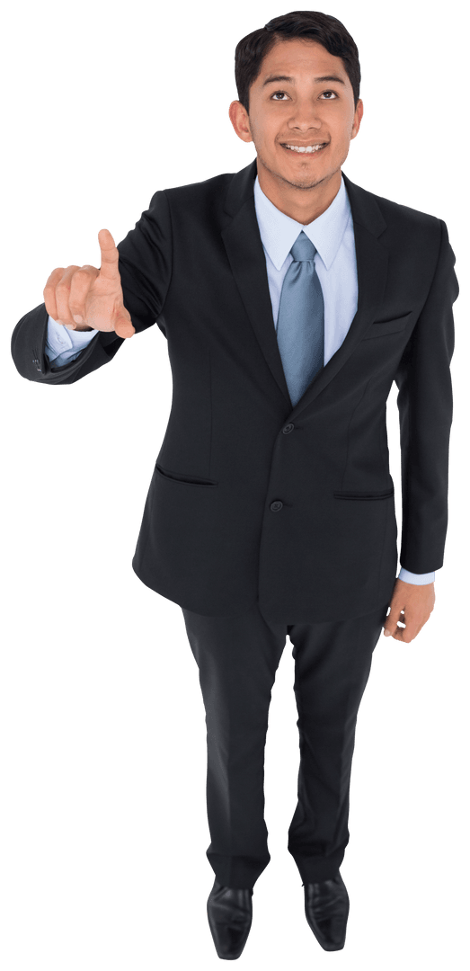 Smiling Businessman in Formal Suit Pointing Upward with Transparent Background