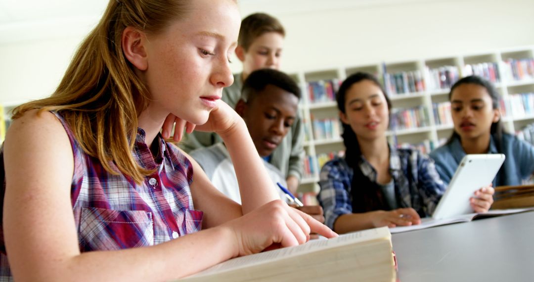 Diverse Group of Students Studying Intently in Classroom