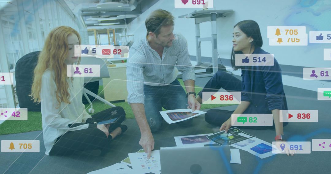 Creative Team Collaborating with Digital Media and Social Metrics