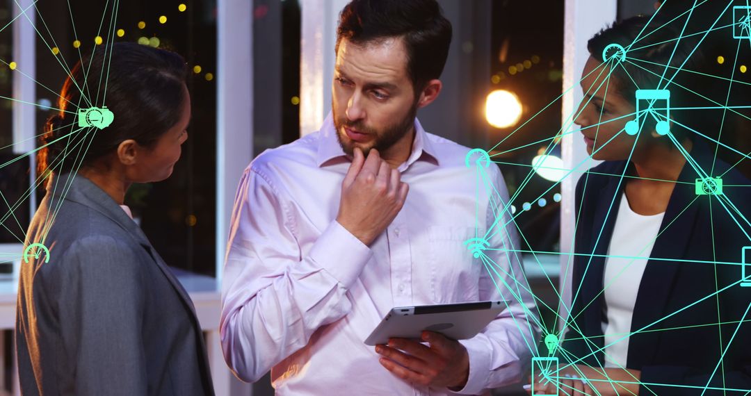 Business Colleagues Analyzing Networked Digital Interface