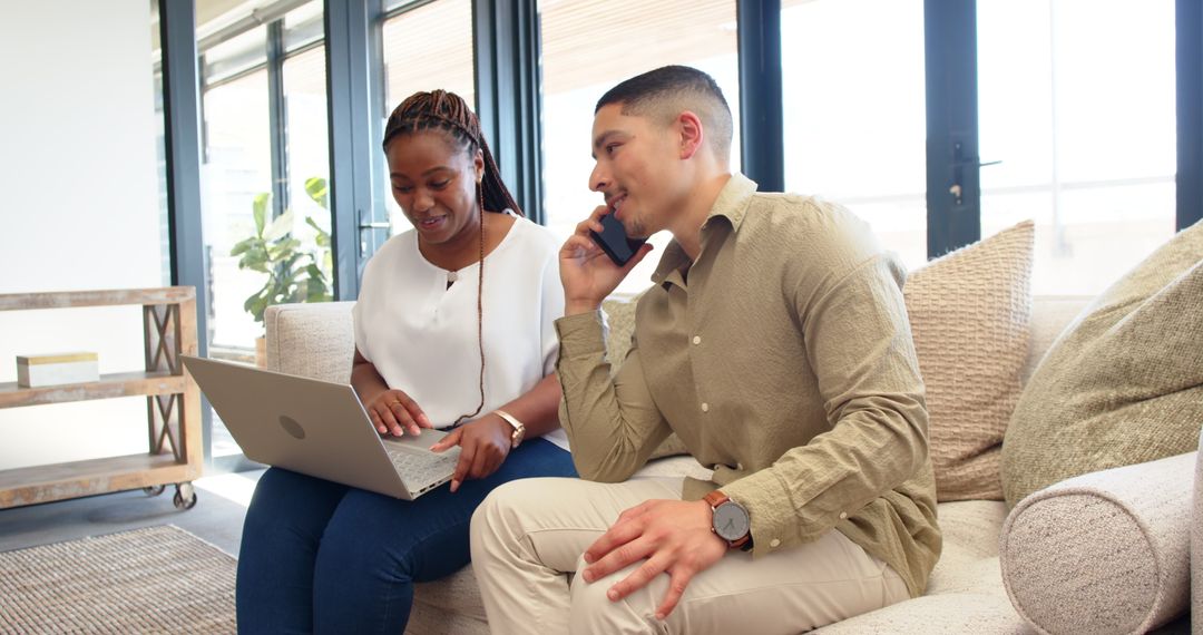 Multiracial Business Team Collaborating with Technology