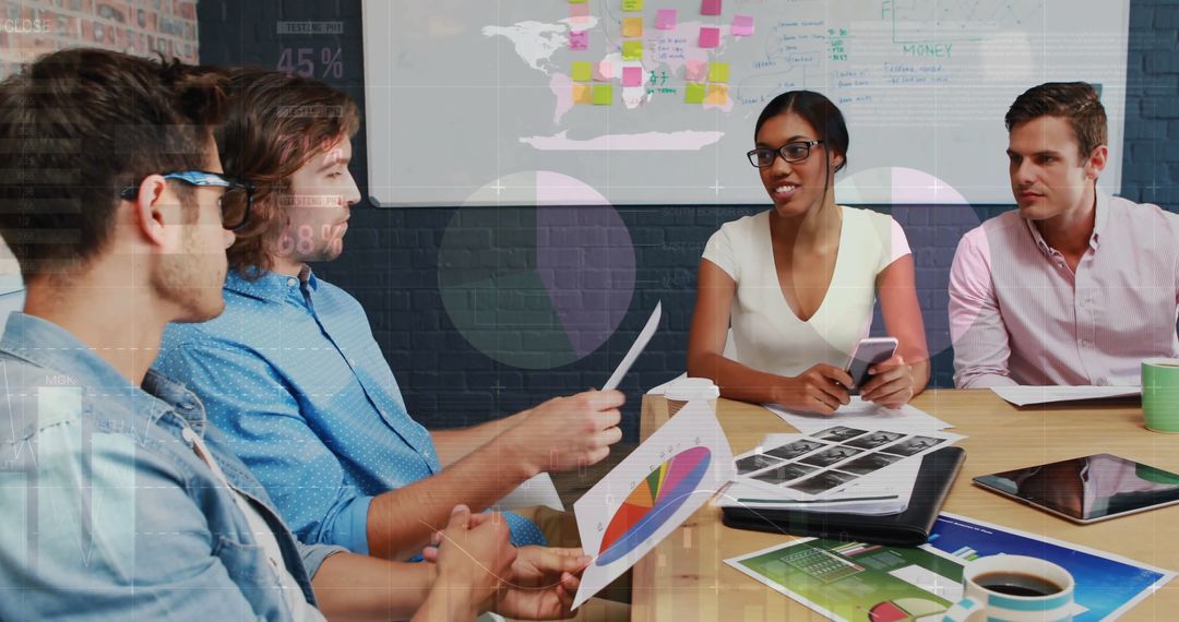 Team Analyzing Financial Data Infographic Discussion in Office