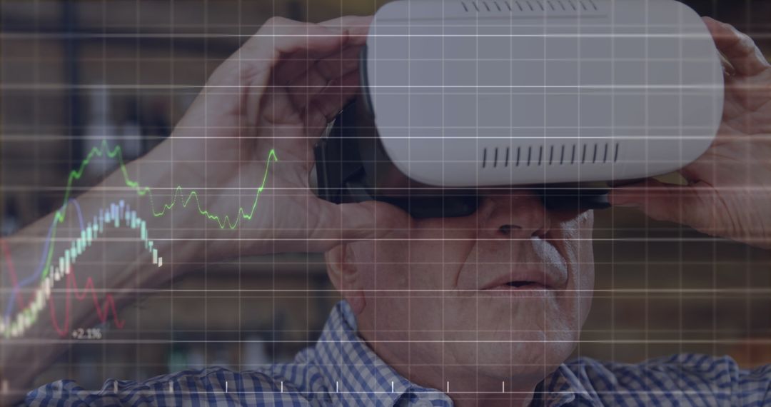 Senior Businessman Engaging with Financial Analytics via VR