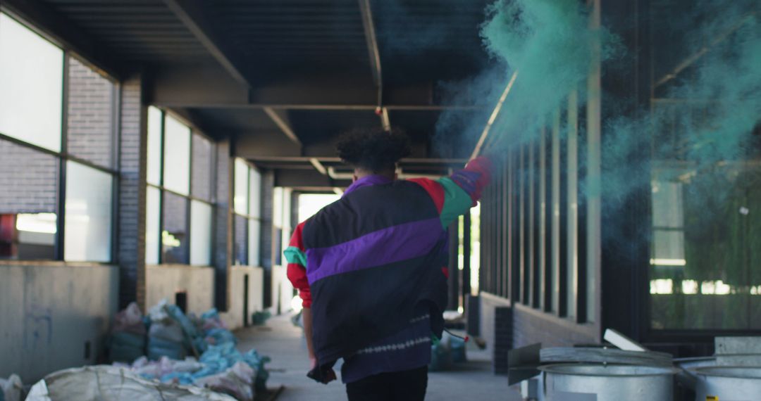 Identity and Freedom: Person Running with Green Smoke Flare