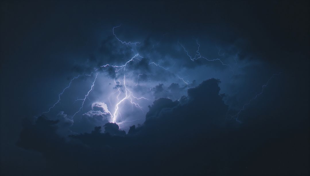 Intense Lightning Bolt Illuminating Night Storm Clouds