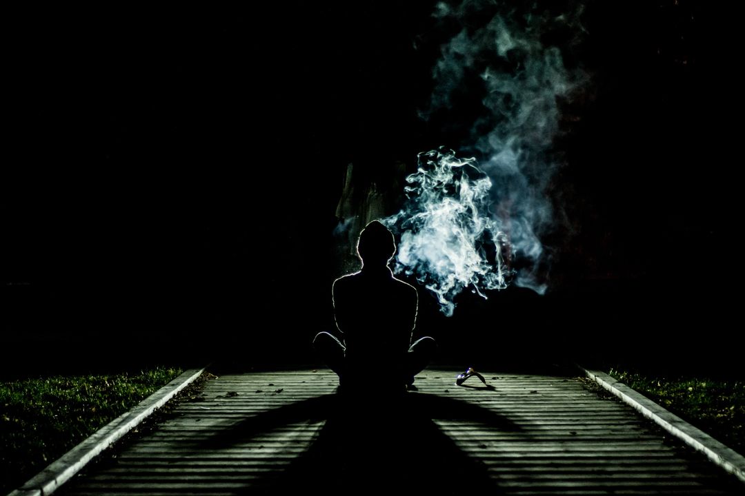 Smoke man meditation night - Free Images, Stock Photos and Pictures on Pikwizard.com