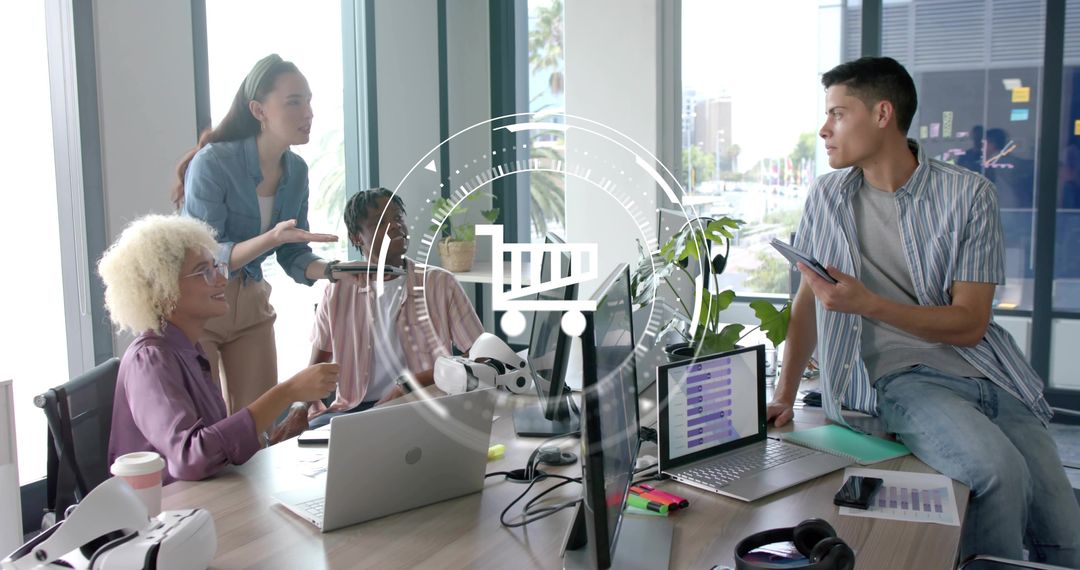 Collaborating diverse tech team planning product launch with laptops VR and analytics