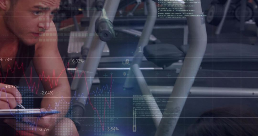 Man Tracking Workout Progress in Notebook at Gym