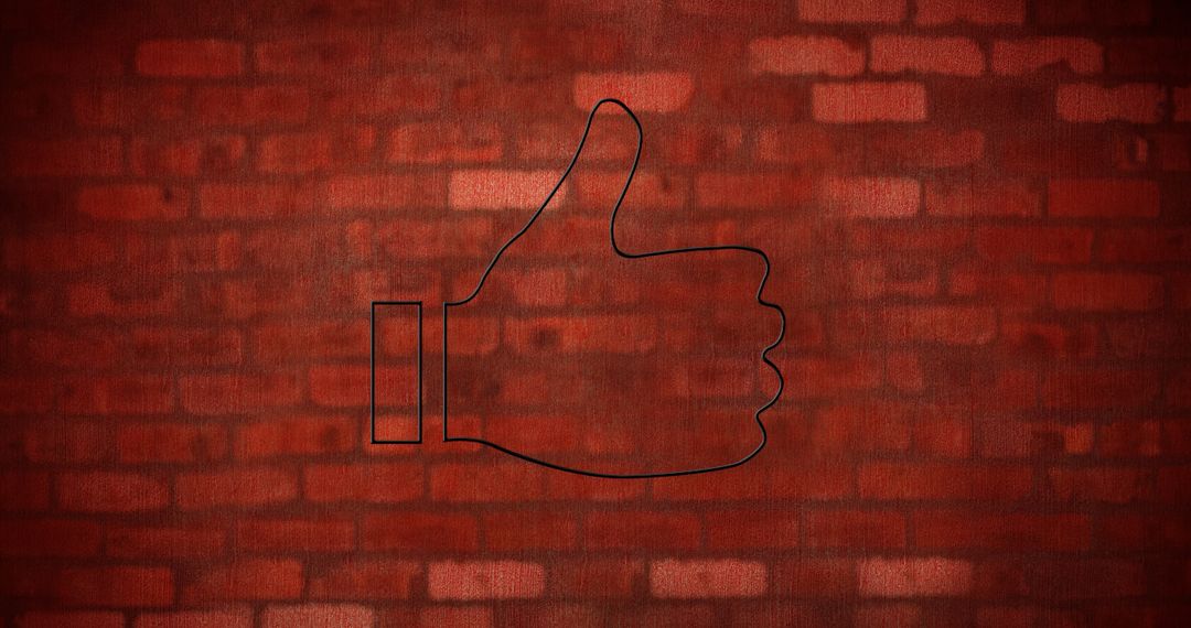 Neon Thumb Up Icon Against Red Brick Wall