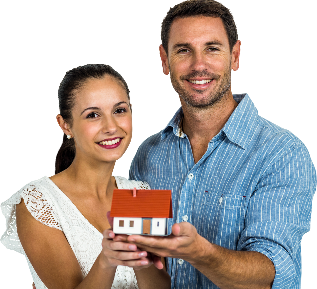 Smiling couple presenting small house model on transparent background - Download Free Stock Images Pikwizard.com