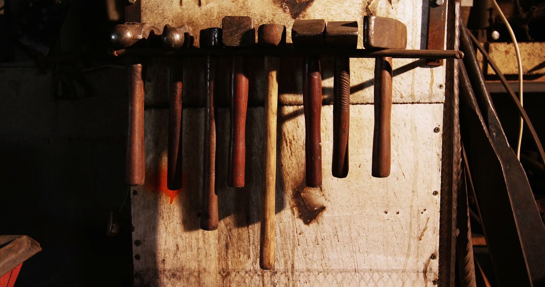 Wooden Handled Tools Hanging in Garage Workshop - Free Images, Stock Photos and Pictures on Pikwizard.com