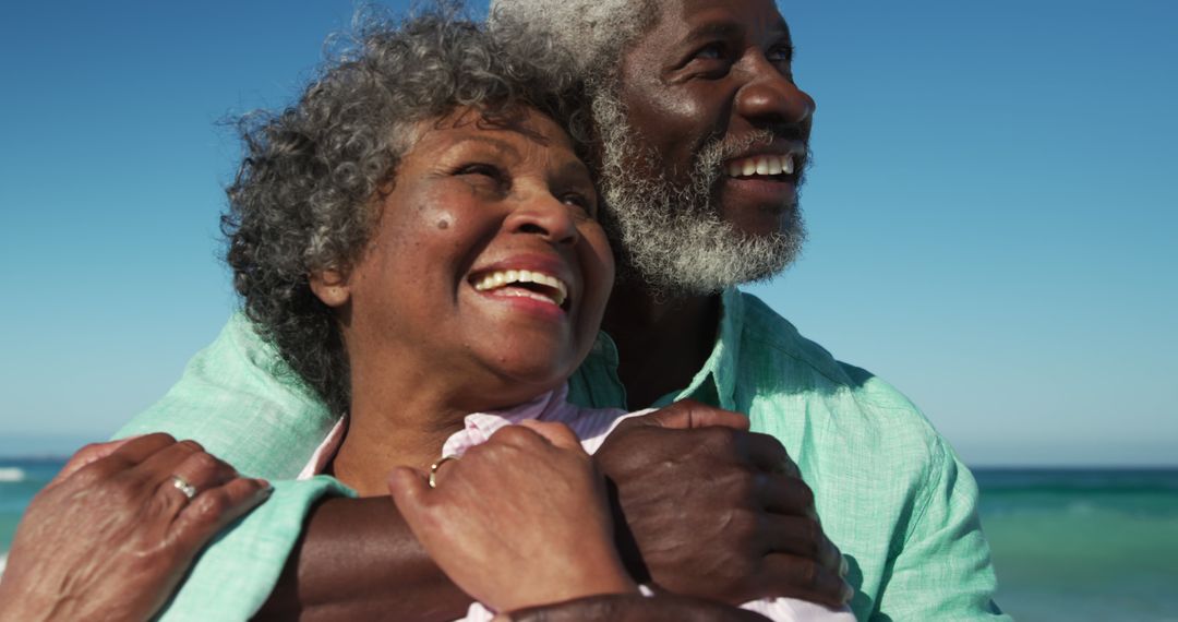 Happy African American Senior Couple Enjoying a Day at the Beach - Free Images, Stock Photos and Pictures on Pikwizard.com