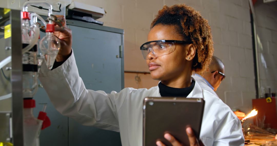 Female Scientist Conducting Laboratory Experiments - Free Images, Stock Photos and Pictures on Pikwizard.com