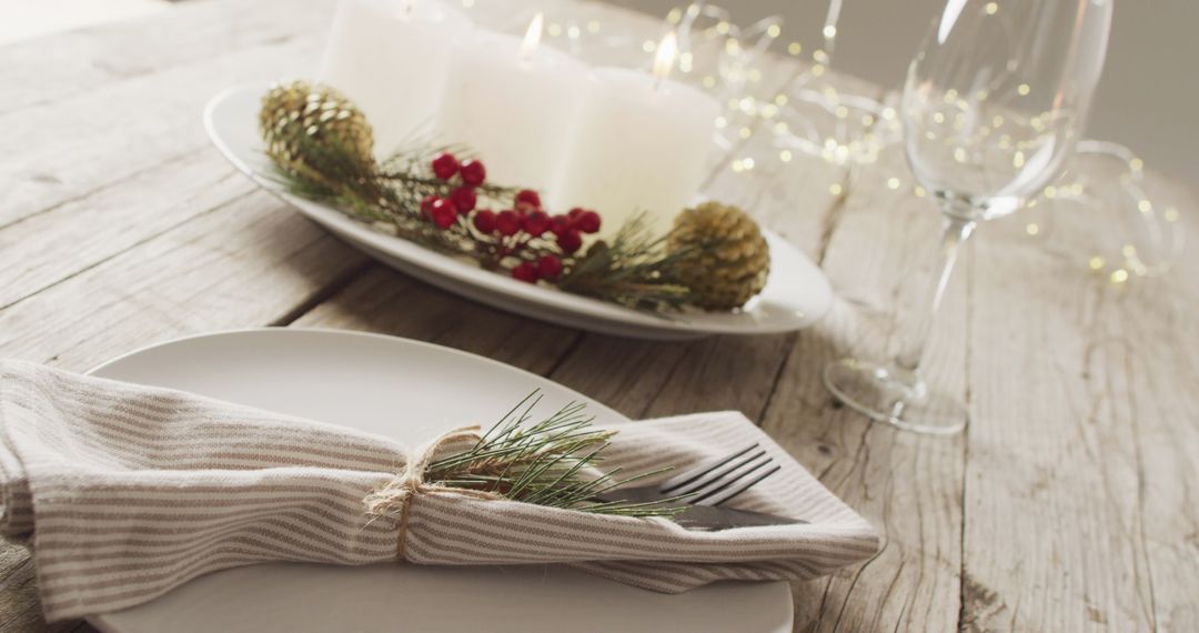 Christmas Table Setting with Candles and Decor