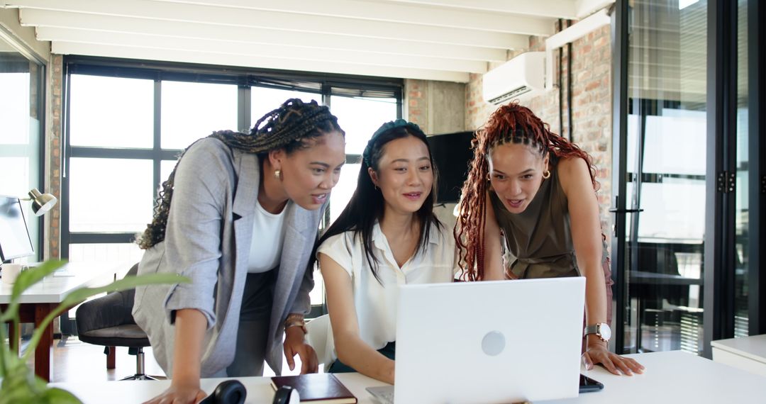 Diverse Team Collaborating Positively in Modern Office