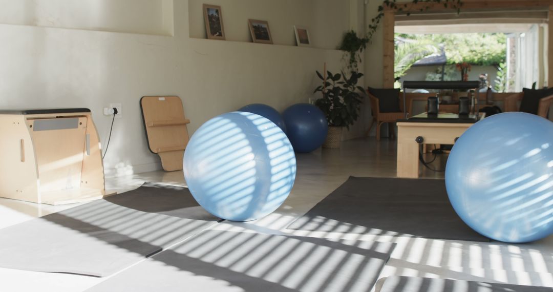 Exercise Room with Pilates Equipment and Sunlit Ambiente