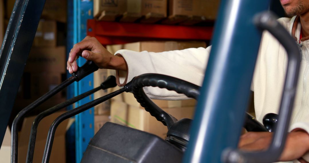 Forklift Driver Maneuvering Machine in Spacious Warehouse Facility - Free Images, Stock Photos and Pictures on Pikwizard.com