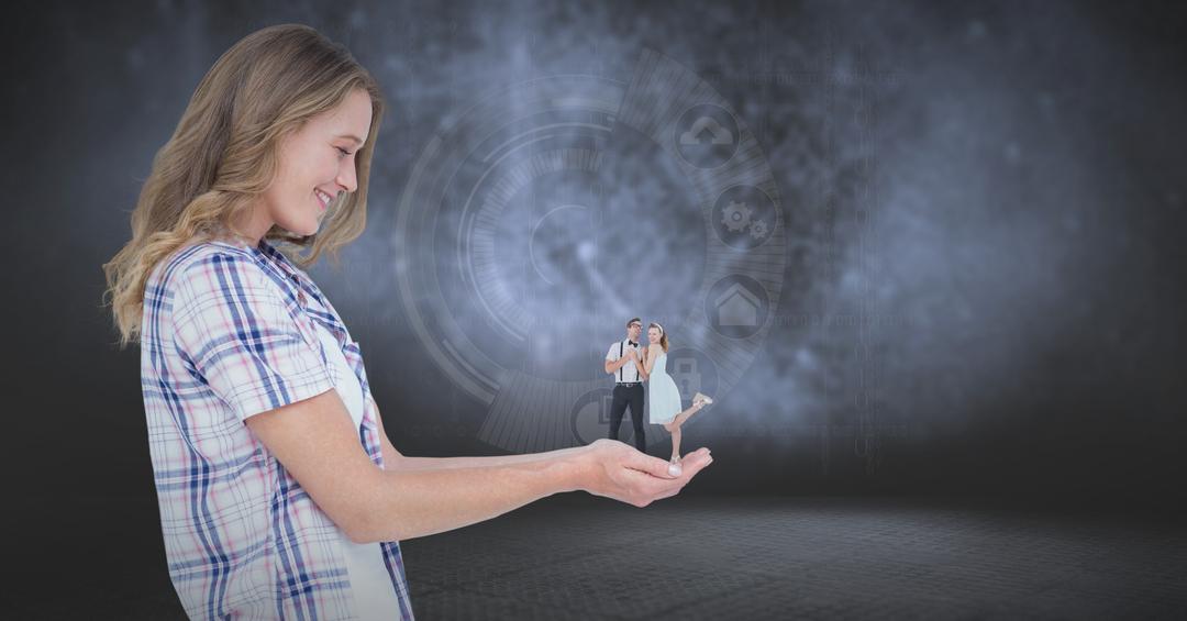Woman Holding Miniature Couple in Hands with Digital Background - Free Images, Stock Photos and Pictures on Pikwizard.com
