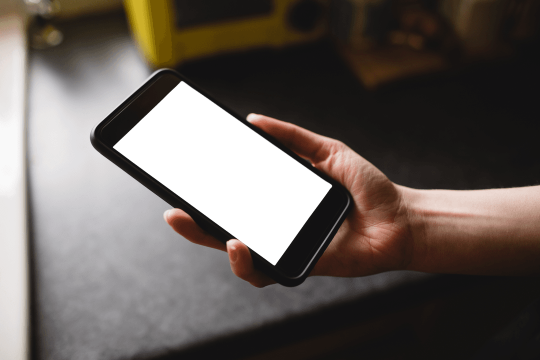Transparent Mobile Phone Mockup in Hand in Kitchen Scene