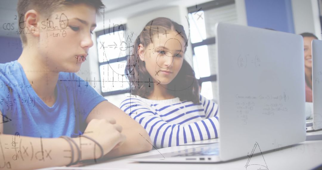 Students Engaging with Laptop in Math-Focused Classroom