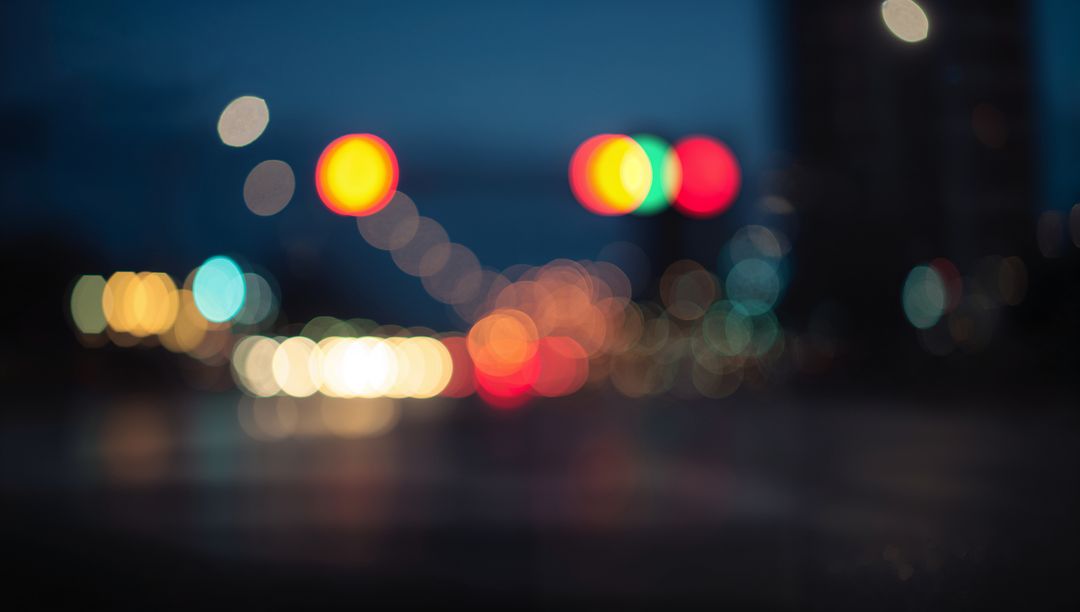 Bokeh City Intersection with Colorful Lights at Night