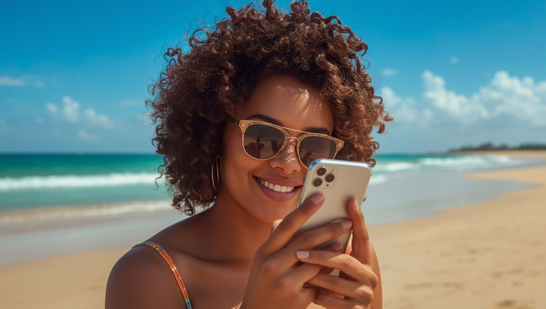 Smiling Woman Enjoying Vacation Checking Smartphone at Beach