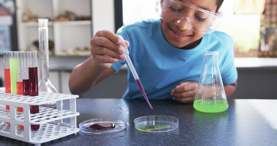 Young Student Conducting Science Experiment with Pipette