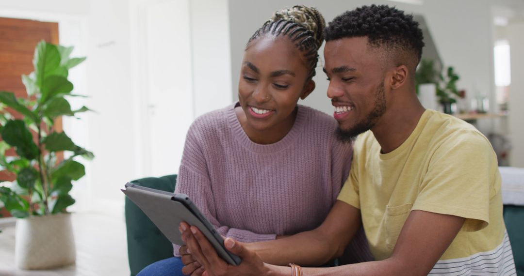 Couple Having a Video Call on Tablet in Cozy Living Room