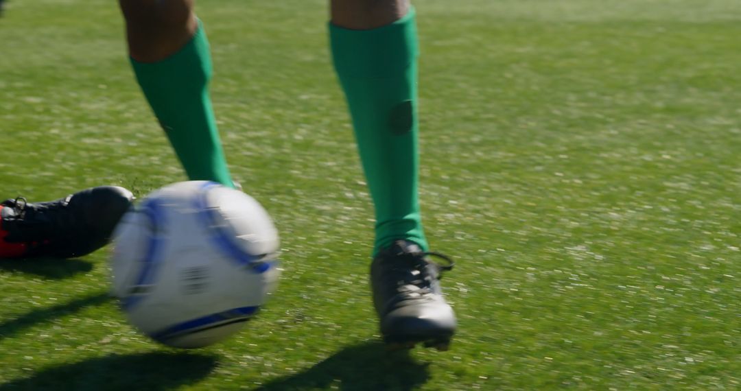 Close-up of a soccer player's feet on the field, with copy space - Free Images, Stock Photos and Pictures on Pikwizard.com