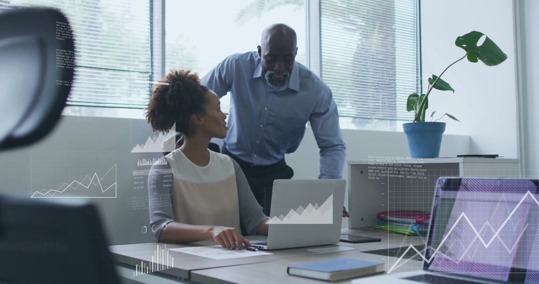 Diverse Business Team Analyzing Financial Data with Technology Overlays