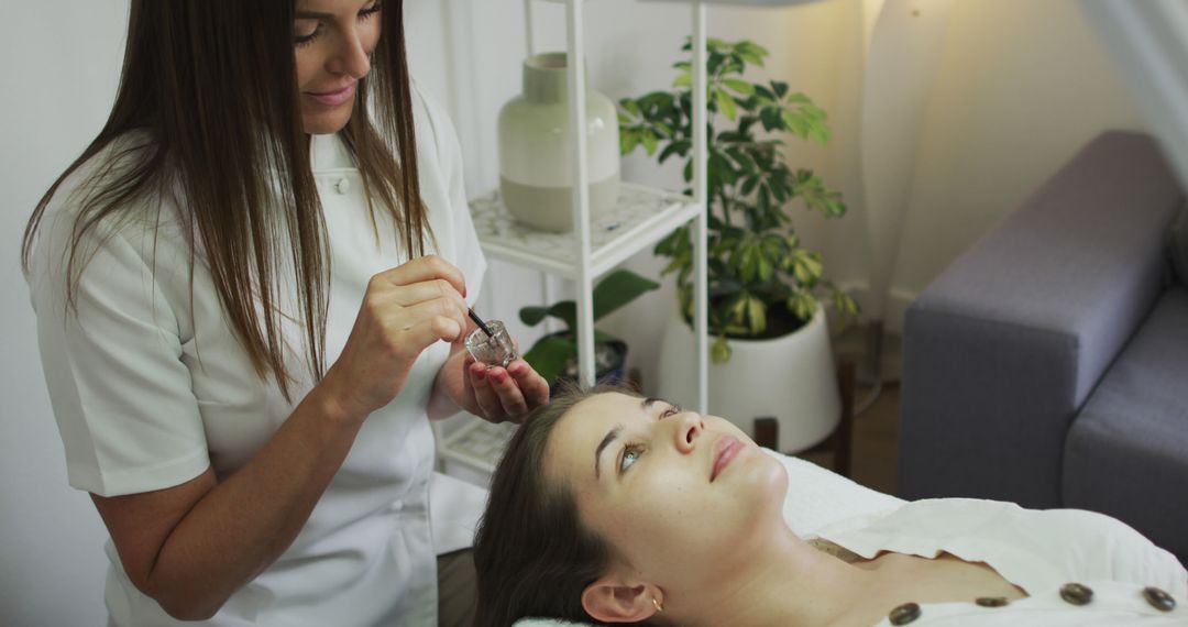 Esthetician Applying Skincare Treatment in Spa - Free Images, Stock Photos and Pictures on Pikwizard.com