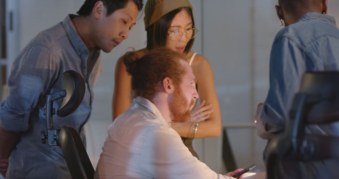 Diverse Team Engage in Animated Office Collaboration