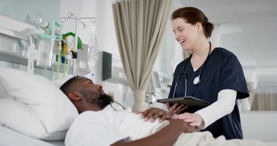 Nurse Attending to Smiling Patient in Hospital Bed - Free Images, Stock Photos and Pictures on Pikwizard.com