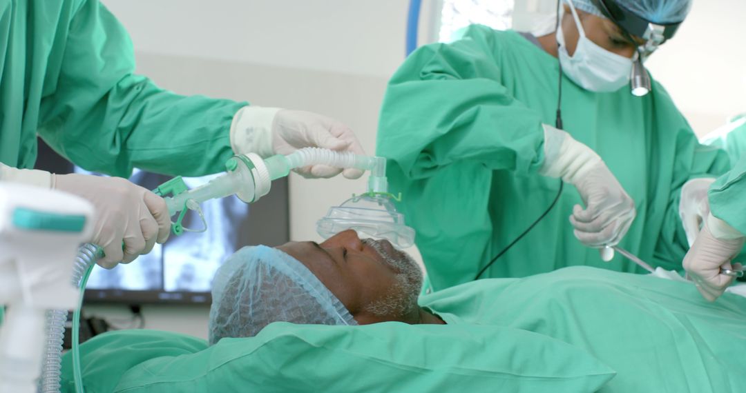 Doctors Preparing African American Senior for Surgery in Operating Room - Free Images, Stock Photos and Pictures on Pikwizard.com