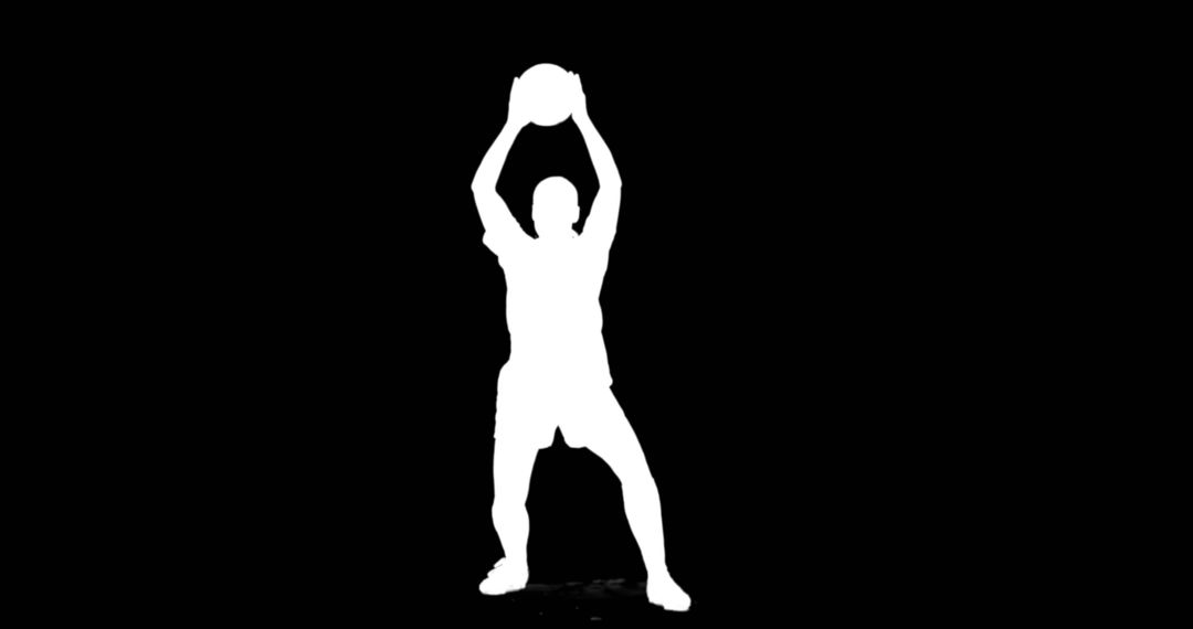 Silhouette of person playing basketball on black background - Free Images, Stock Photos and Pictures on Pikwizard.com