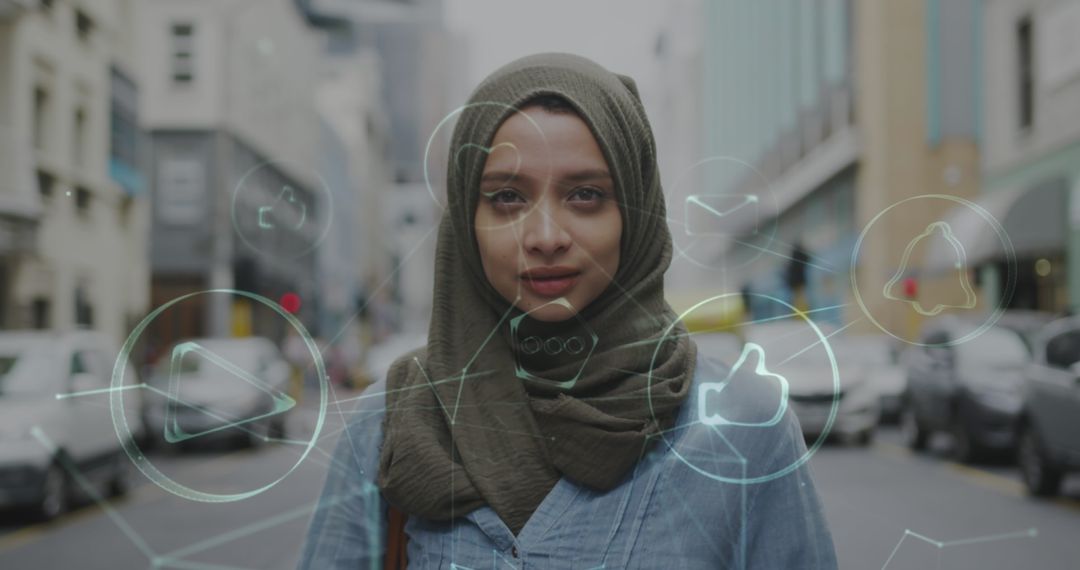 Smiling Woman in Hijab Surrounded by Digital Icons, Embracing Technology