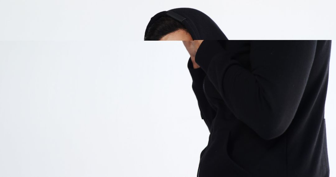 Mysterious Hooded Figure Wearing Black Hoodie - Free Images, Stock Photos and Pictures on Pikwizard.com