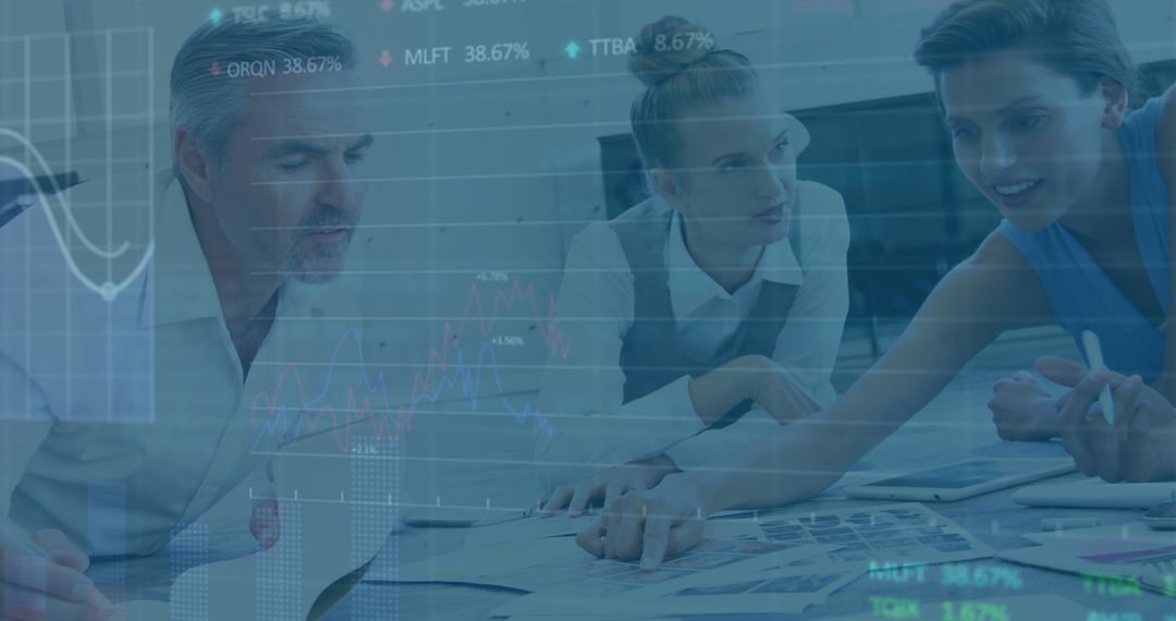 Business Team Analyzing Financial Trends with Data Visualization