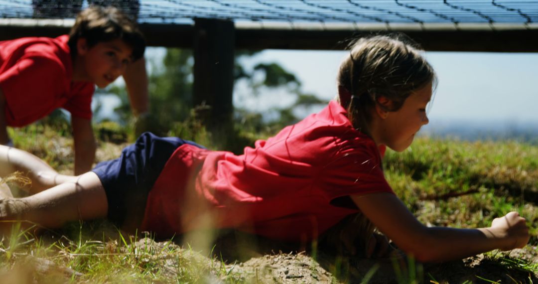 Children Navigating Outdoor Obstacle Course on Sunny Day - Free Images, Stock Photos and Pictures on Pikwizard.com