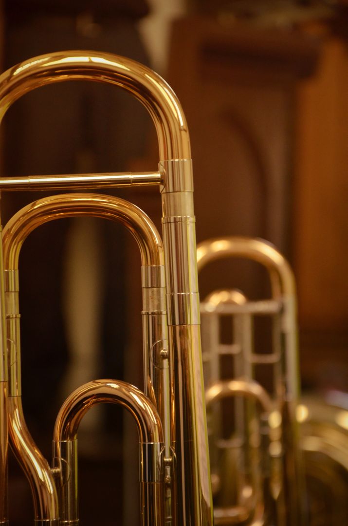 Close-up of Shiny Brass Trombones in Symphonic Orchestra - Free Images, Stock Photos and Pictures on Pikwizard.com
