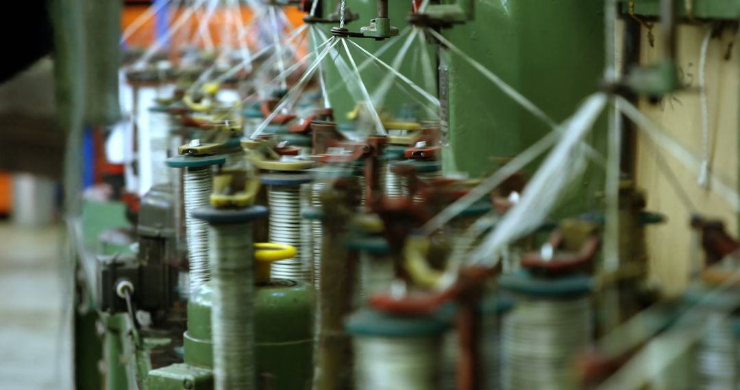 Close-up of Spools in Textile Factory - Free Images, Stock Photos and Pictures on Pikwizard.com